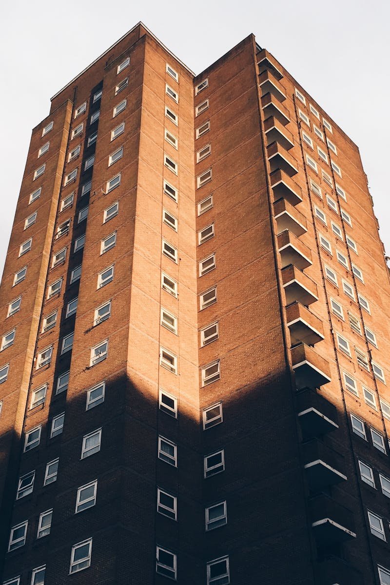 A tall residential apartment building with a classic facade in Brighton, England.